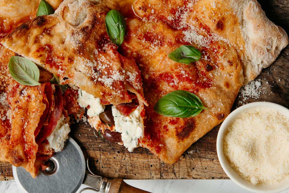 SALAMI, RICOTTA, AND OLIVE CALZONE