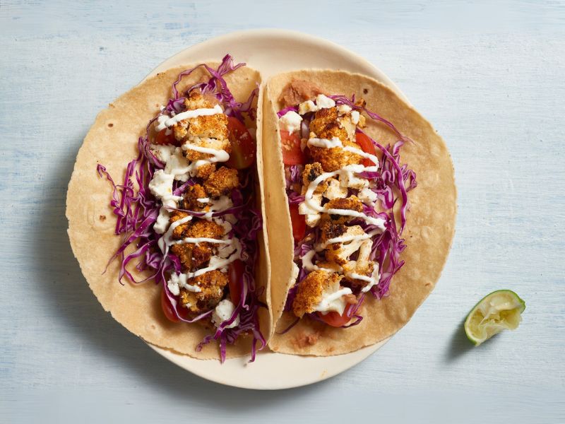 ROASTED CAULIFLOWER TACOS WITH LIME CREMA